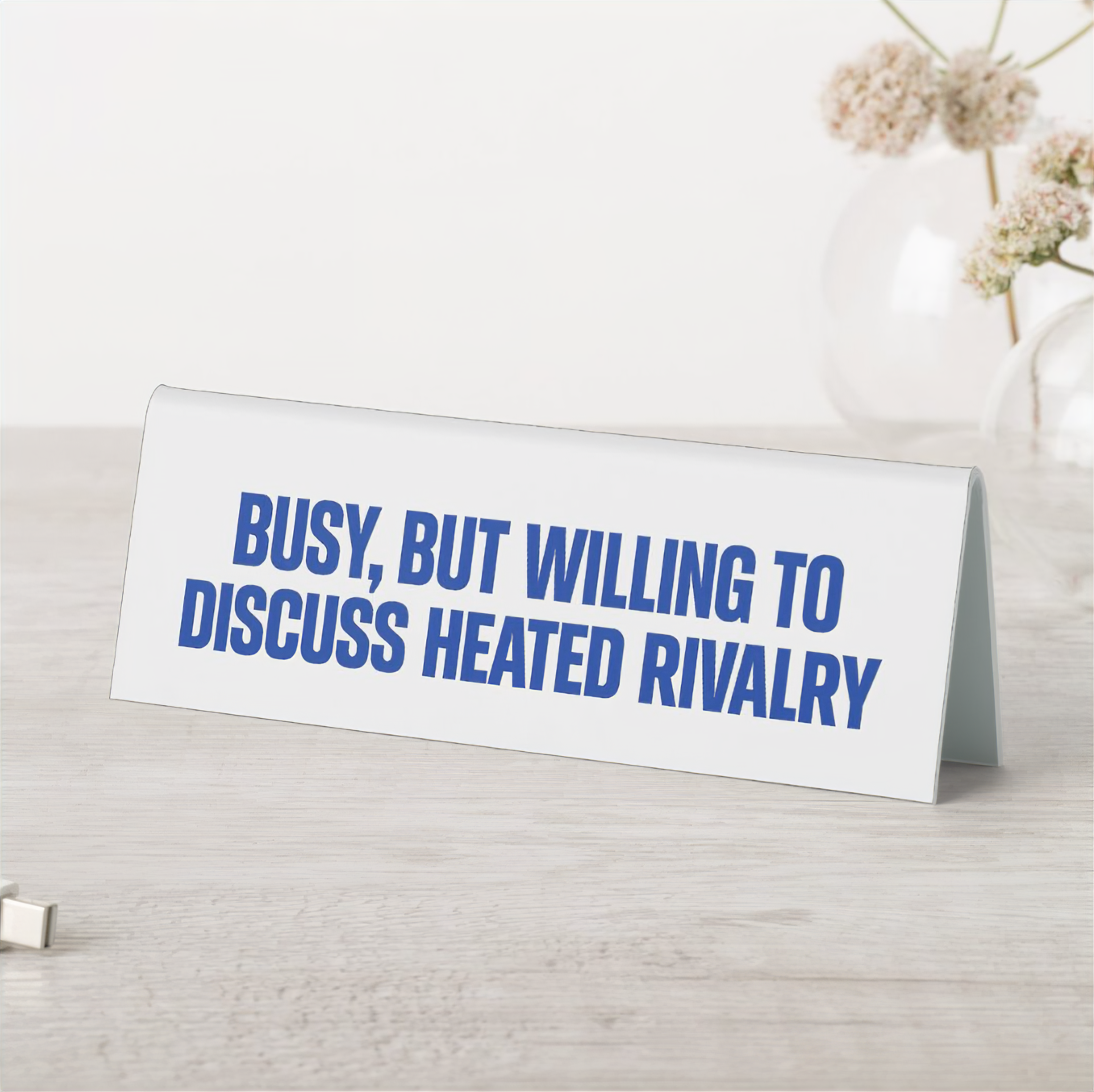 Busy But Willing to Discuss Heated Rivalry Desk Sign